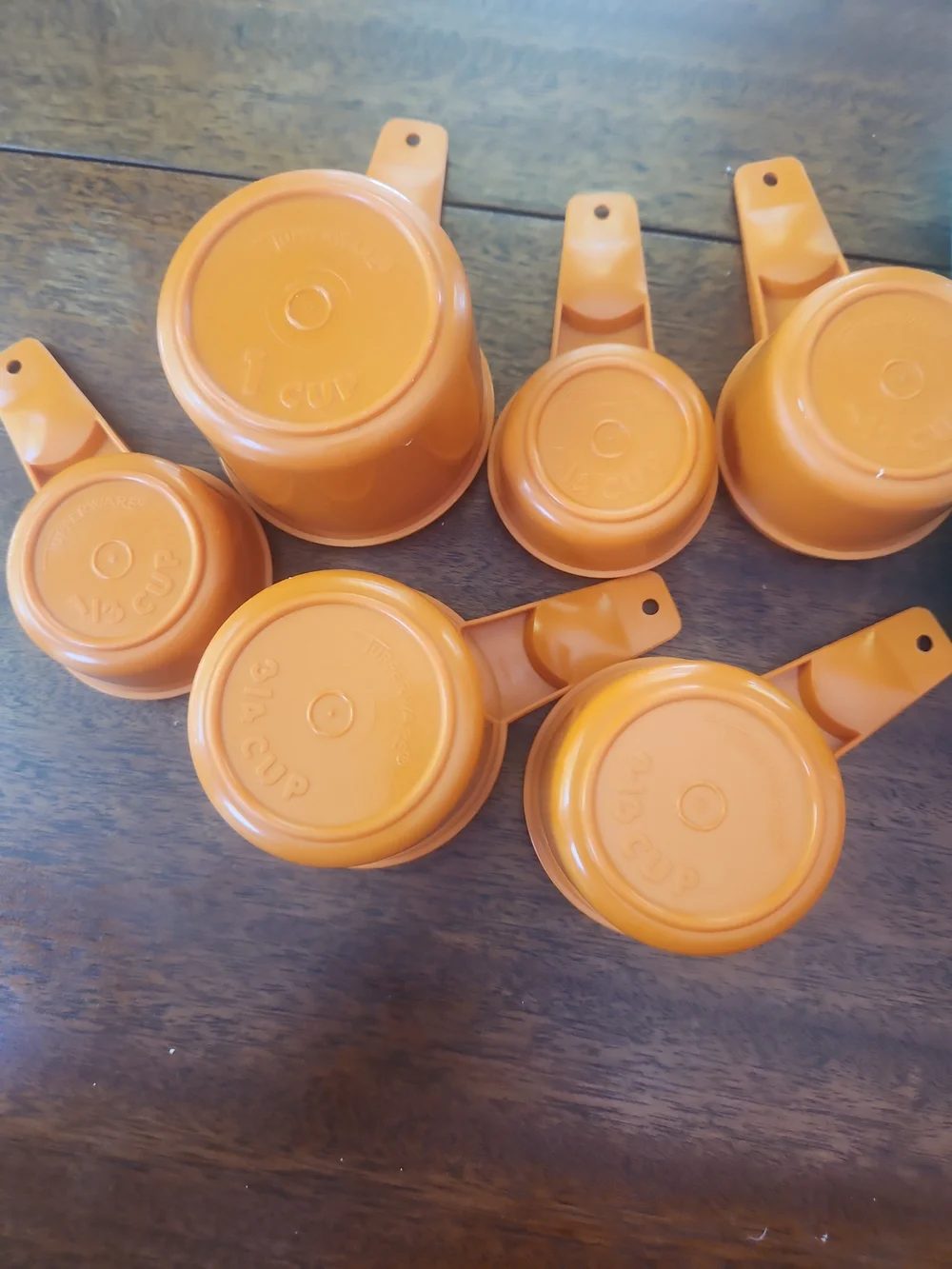 TupperwareOrange Plastic Measuring Cups Plus Other Helpful Kitchen Items